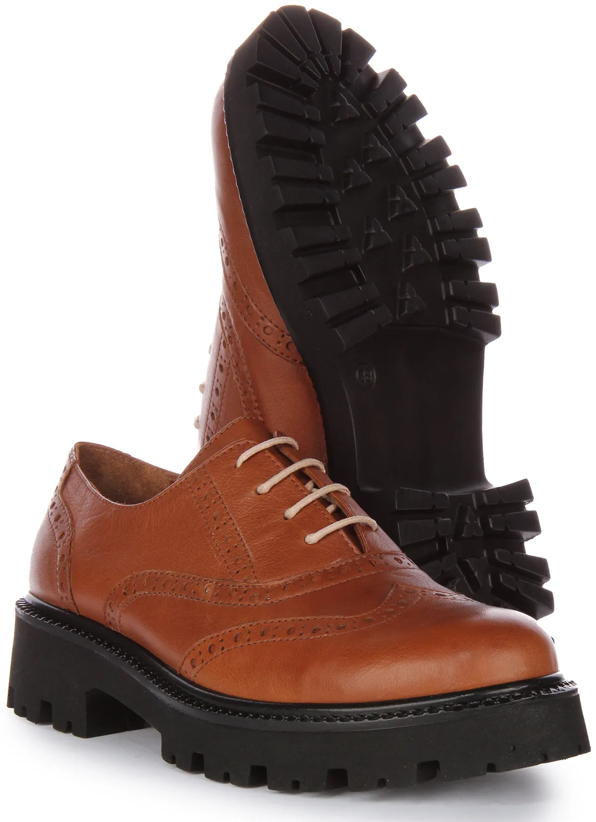 JUSTINREESS Millie Zapatos Oxford de cordones de piel para mujer en negro blanco